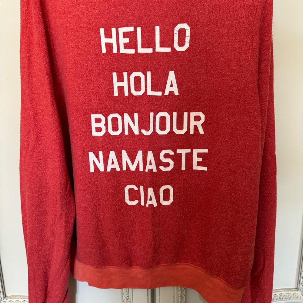 Red Graphic Sweatshirt with Multilingual Greeting